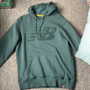 Brand new size medium mens New Balance Hoodie.